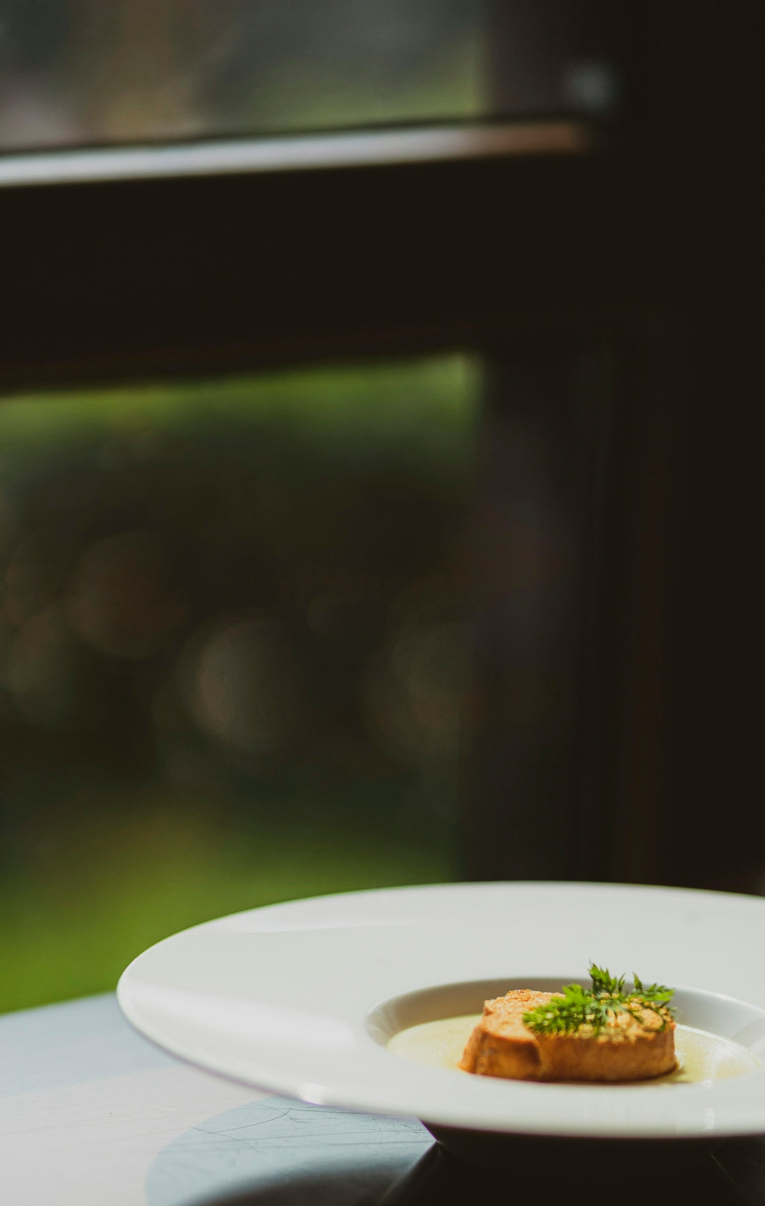 white ceramic plate on table