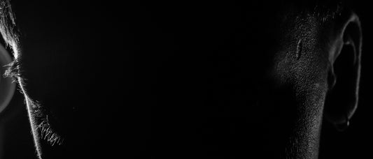 a black and white photo of a man's face