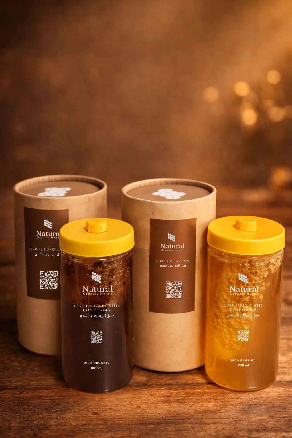 Natural organic honey jars with honeycomb and brown paper packaging on wooden table